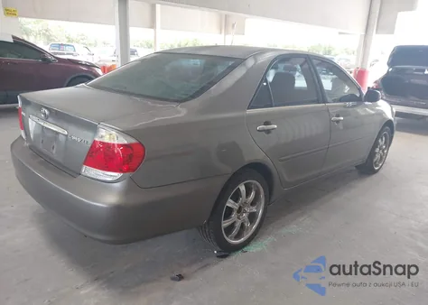 2005 Toyota Camry Le z USA, uszkodzony, nr VIN 4T1BE32KX5U614561